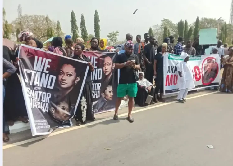 “‘Akpabio Must Go’: Protesters Storm National Assembly Over Sexual Harassment Allegations”